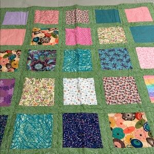 Vibrant Patchwork Quilt with Green Border